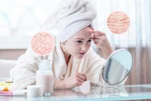 woman-looking-her-dry-skin